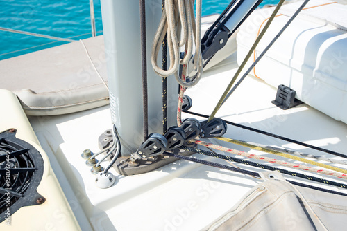 Wallpaper Mural Closeup detail of mast base and rigging on luxury pleasure sailing yacht boat with blue ocean background Torontodigital.ca