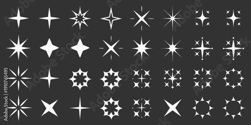Collection of various white starburst and sparkle shapes on a black background
