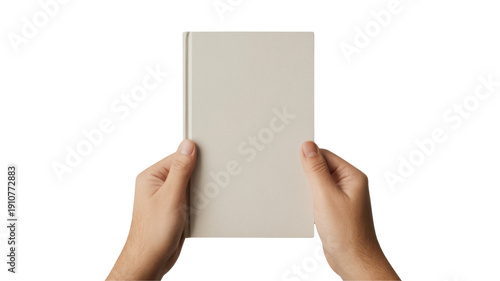 Hands holding a blank beige book cover vertically