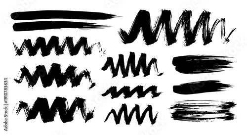 Variety of black brush strokes and scribbles for creative design