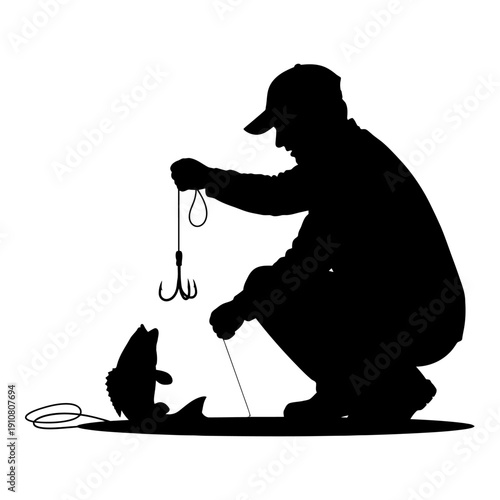 Silhouette of a fisherman catching a fish with a fishing hook.