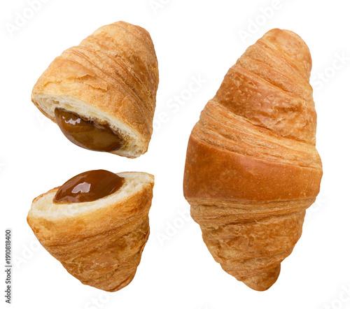 Set of croissants and two halves with jam cut out on a white.