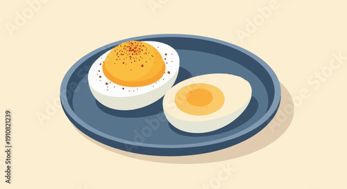 Halved hard-boiled eggs with seasoning on a dark plate