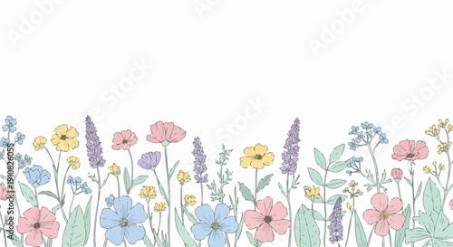 pastel colored wildflowers in a field.