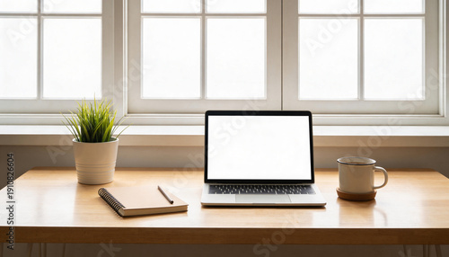 Modern Workspace - Laptop, Notebook, and Plant on Desk
