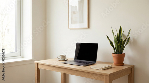Minimalist Workspace with Laptop and Plant