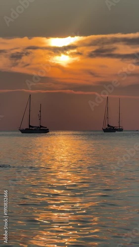 boat, sunset, ocean, yacht, sun, sea, water, sky, sailboat, sail, silhouette, sunrise, ship, sailing, travel, horizon, evening, summer, nature, dusk, clouds, cloud, fishing, calm