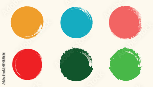A collection of six oval shaped colorful paint swatches on a white and transparent background.