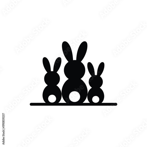 Simple black silhouette illustration of three rabbits standing together