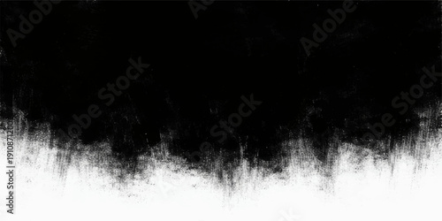 Black ink splat on black and white abstract background