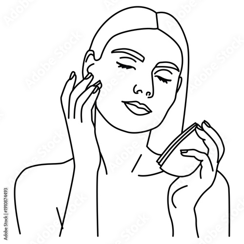 girl takes care of her face and applies cream