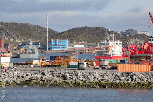 Nuuk, Greenland, September 4, 2025, Industry and Business Along the Shore of the Nuuk Fjord, with Housing in the Hills