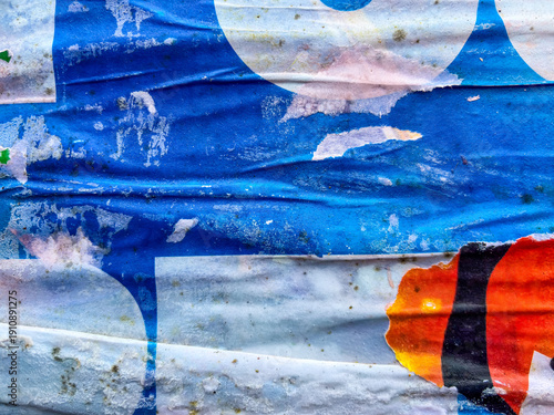 Old grunge ripped, torn vintage posters creased crumpled paper surface texture background