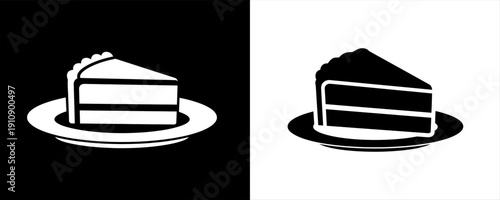 Two slices of cake on plates, one black and one white
