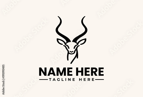 A logo featuring a stylized illustration of an antelope's head with curved horns and a placeholder text 'NAME HERE' and 'TAGLINE HERE' on a clean white background.