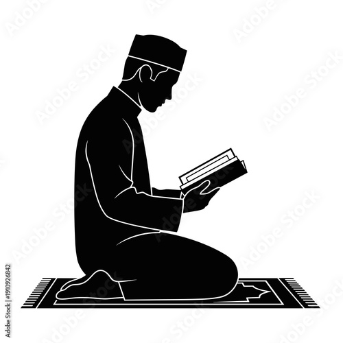Black silhouette of a man reading a book while sitting