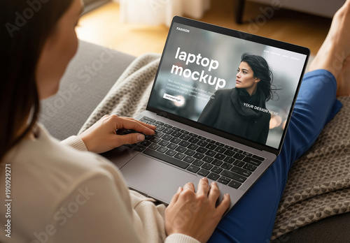 A woman using a laptop mockup