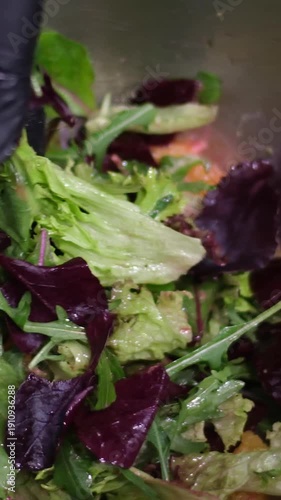 the process of preparing a salad with beet greens and oranges, add to an iron bowl, mix, put on a plate