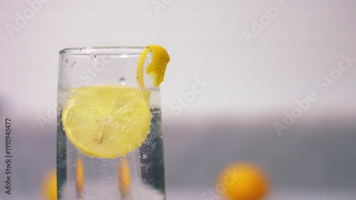 Serving of fizzy lemonade juice in a glass