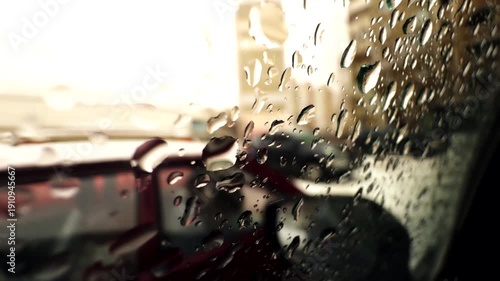 Raindrops on Car Window Glass. Wet Autumn Road Trip