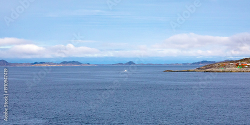 Nuuk, Greenland, September 2025, View of the Nuuk Fjord and its Islands and Mountains Under Blue Sky and Fluffy Clouds