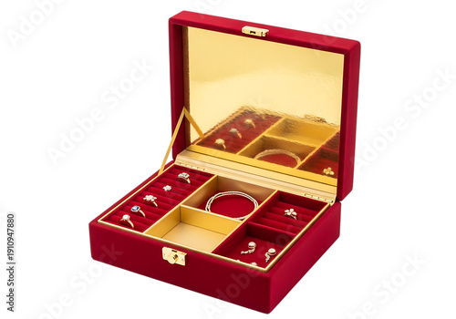 A luxurious red jewelry box with gold interior and compartments.