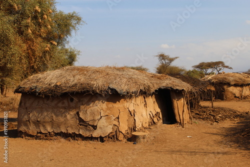 Traditional Maasai mud hut village in Amboseli region, Kenya