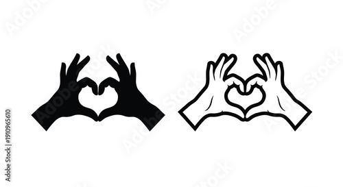 Two hands forming heart shapes one dark and one light silhouette
