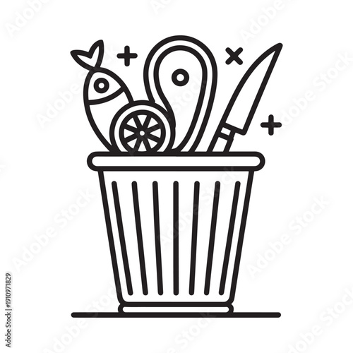 Food waste in a trash can fish lemon and a knife