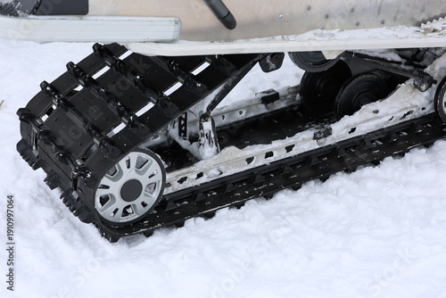 Snow-covered snowmobile tracks. High quality photo