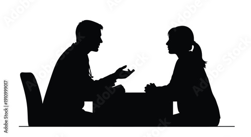 Silhouette of a man and woman engaged in a conversation at a table