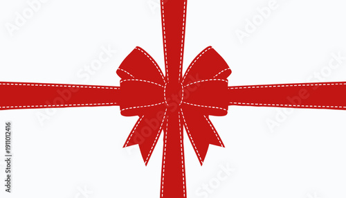 Red ribbon with bow on white background.