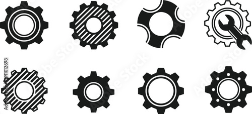 Mechanical gear and cogwheel icon set with wrench tool, black and white vector illustration for engineering, industry, and maintenance.