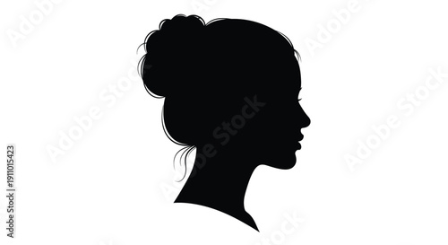 Silhouette of a woman s face and hair in a stylish updo