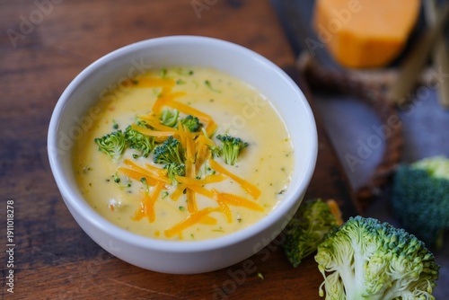 Homemade Cheddar Broccoli Soup served in a bowl, selective focus
