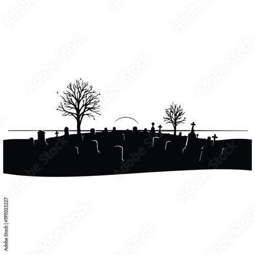 Silhouette of old cemetery with bare trees at sunset
