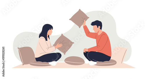 Joyful Couple Engaged in Playful Pillow Fight Indoors