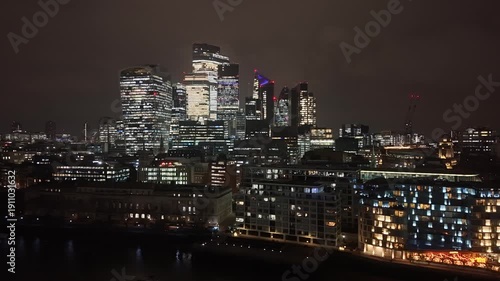 Wallpaper Mural Establishing aerial view of London at night. Beautiful illuminated skyline of the capital of the United Kingdom Torontodigital.ca