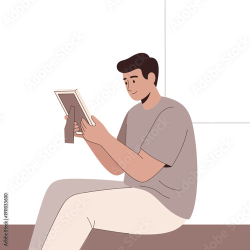 Man Holding Cherished Framed Photograph Reflecting On Memories Nostalgia