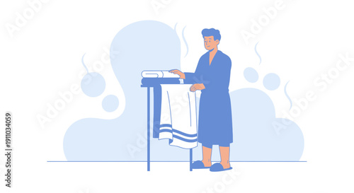 Man In Blue Robe Arranging Freshly Folded Towels On A Stand