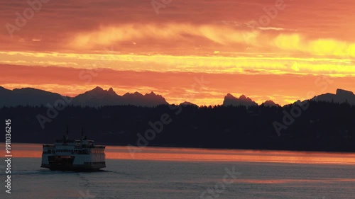 Sunrise landscape in the Pacific Northwest. A ferry crossing the Puget sound at dawn.	
