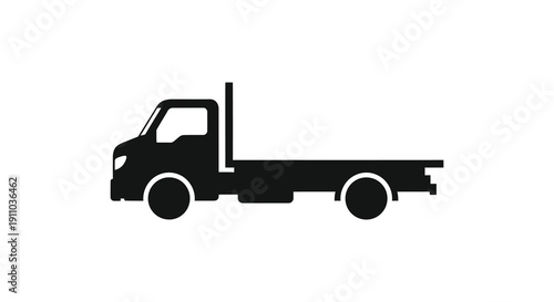 A simple black silhouette depicts a flatbed truck seen from the side showcasing its functional design high quality