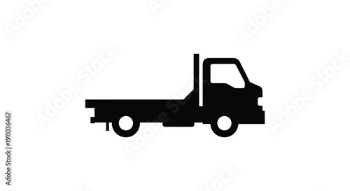 A minimalist black silhouette depicts a side view of a medium duty truck with a flatbed high quality professional