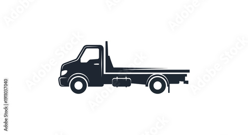 A minimalist black silhouette depicts a flatbed truck viewed from its side emphasizing its utility high quality professional