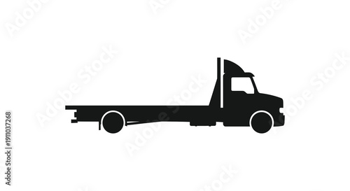 A stark silhouette depicts a flatbed truck facing right showcasing its simple form and industrial design high quality