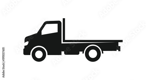 A simple black silhouette depicts a flatbed truck viewed from the side showcasing its boxy structure high quality