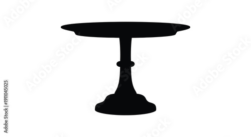 A stark silhouette depicts a classic ornate bistro table against a plain white backdrop isolated high quality professional