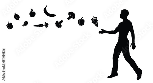 Silhouette of a man juggling various fruits and a fish in the air