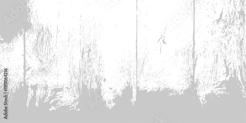 An abstract black ink splat creates a grungy paint texture on an old grey paper surface with a rough vintage wall design