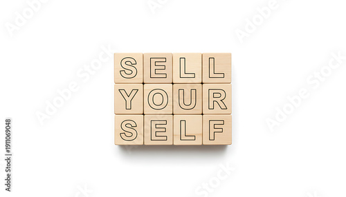 Wooden blocks spelling S E L Y O U R S E L F on white background